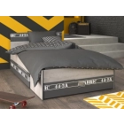 Kinderbed Fabric van Parisot met twee grote, uitschuifbare opberglades voor speelgoed of beddengoed.